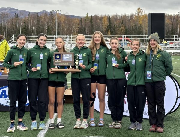 From left to right: Sadie Haas, Maddie Haas, Olive Jordan, Juniper Ingalls, Katie Van Buskirk, Selah Brueckner, Lucy Bamford, coach Rachel Dow.